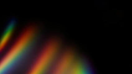 Blurred rainbow refraction overlay effect. Light lens prism effect on black background. Holographic reflection, crystal flare leak shadow overlay. Colorful rainbow disco ball light