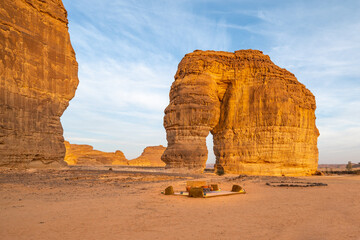 People relax at Elephant Rock, in AlUla, Saudi Arabia