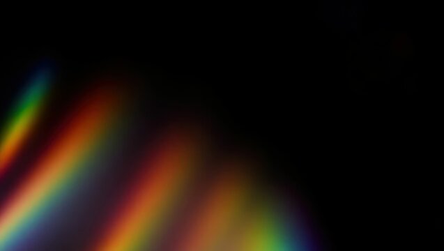 Blurred rainbow refraction overlay effect. Light lens prism effect on black background. Holographic reflection, crystal flare leak shadow overlay. Colorful rainbow disco ball light - Powered by Adobe