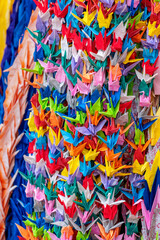 Fototapeta premium 1000 cranes origami created as a prayer for peace on display in Peace Memorial Park, Hiroshima, Japan