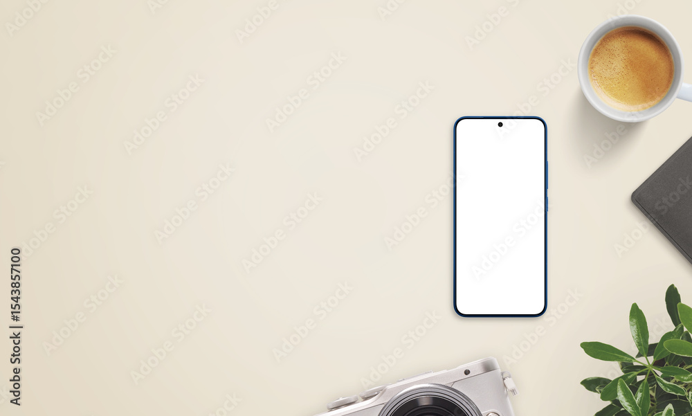 Poster smartphone mockup on beige desk with large empty space on left for promo text. surrounded by coffee,