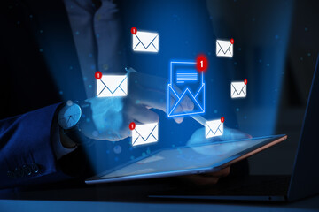 Email marketing, new message notification. Man using tablet computer at table, closeup