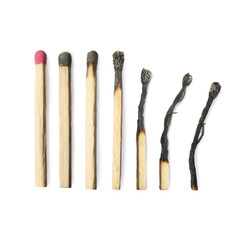 Matches on white background, collage with stages from whole to completely burnt