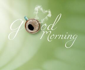 Good Morning inscription with cup of coffee instead of letter O on green background, top view
