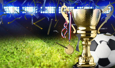 Football championship. Shiny golden trophy cup with medal and soccer ball under falling confetti on stadium, banner design