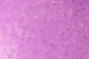 Pink plaster wall with mottled soft texture and subtle light effect