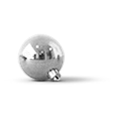 A shiny silver ornament, possibly for holiday decoration, reflecting light and surroundings.