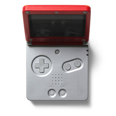 An open handheld gaming console featuring a directional pad and buttons for gameplay.