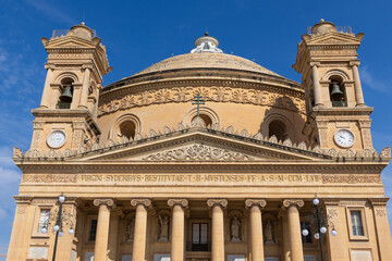 Fototapeta premium Malta, Mosta. Facade of the Sanctuary Basilica of the Assumption of Our Lady or Rotunda of Mosta. 17th century Catholic church. Third-largest unsupported dome in the world.