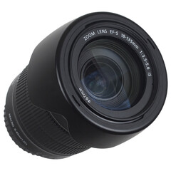 A camera zoom lens designed for versatile photography, suitable for capturing various subjects with...