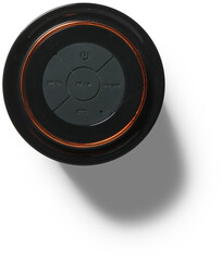 A circular device with control buttons, likely a remote or speaker control.