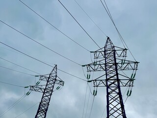 Power line on a blue sky background. High quality photo