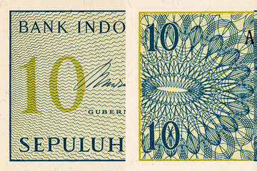 Fragment of a 10 sen banknote of Indonesia, 1964. Indonesian money. © Sergii