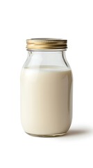 Creamy Fresh Milk in Glass Jar Container with Golden Lid on White Background Studio Shot
