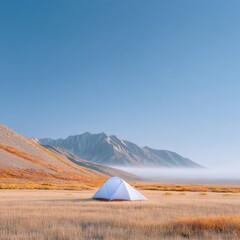 Lone Tent in Mountain Valley Fog at Sunrise