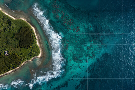 Aerial view of coastline with visible coral reef and icon grid showing protected marine zones.