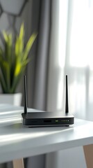Modern Black Wireless Router with Antenna Leaning on White Table Next to Plant