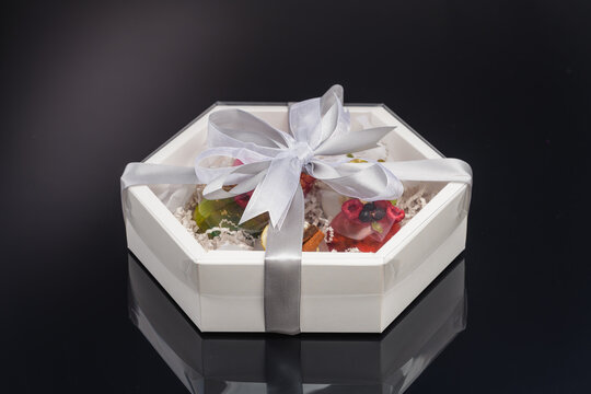 fruit berry tea in transparent balls and heart.
