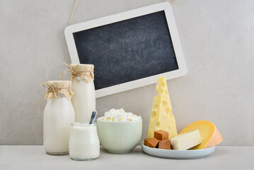 Various dairy products with framed chalk board