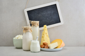 Various dairy products with framed chalk board