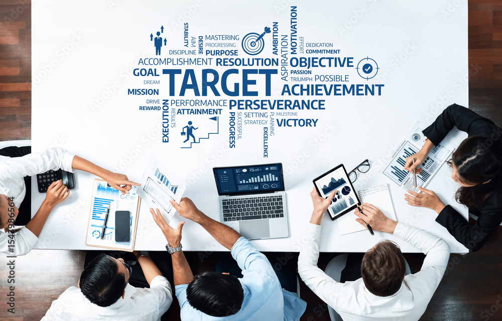 Poster A top-down view of a business team analyzing performance metrics and strategies to achieve targets. The scene captures collaboration and commitment to success. Amity
