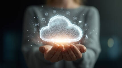 Obraz premium Cupped hands hold a glowing, holographic cloud icon, symbolizing cloud computing, data storage, and digital connectivity. 