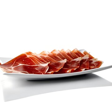 Lonchas de jam&oacute;n curado dispuestas en plato blanco para una presentaci&oacute;n gourmet
