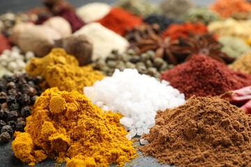 Different aromatic spices as background, closeup view