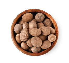 Nutmegs in bowl isolated on white, top view