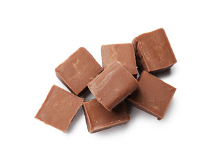 Pieces of tasty chocolate butter isolated on white, top view