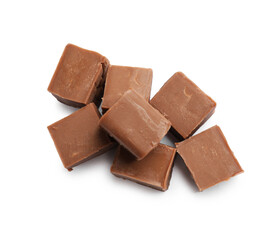 Pieces of tasty chocolate butter isolated on white, top view