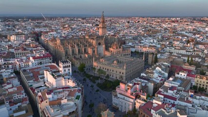 Cathedral of Seville, Aerial of the gothic Building with its famous Giralda bell tower in old town in Andalusia, Spain. - Powered by Adobe