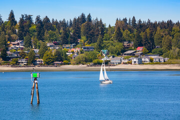 Sailboat in Eagle Harbor, Winslow, Bainbridge Island, Washington State, USA.