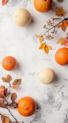 Autumn Pumpkins and Oranges with Leaves on Wood Background