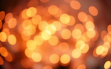 Obraz premium Abstract red and gold Christmas bokeh background with glowing festive lights. Perfect for holiday celebration, greeting cards, or winter event designs. Warm, cheerful, and magical mood.