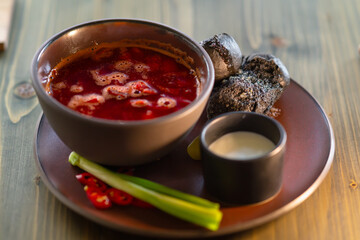 Ukrainian borscht that features black buns.