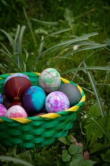 colorful easter eggs in a basket