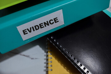 folders with the label Evidence. Business management concept