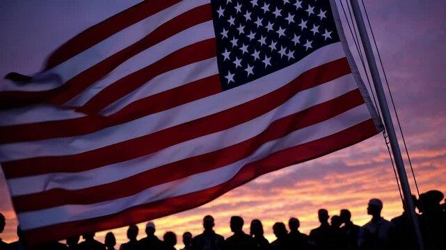 Patriotism shines during sunset as people gather beneath the American flag in a display of unity and love for the country