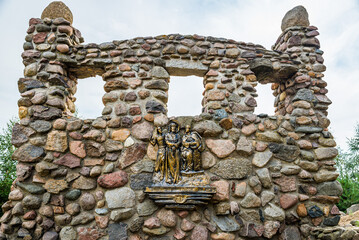 Swiebodzin, Poland - August 21, 2021. Religion symbols by the tallest statue of Jesus Christ