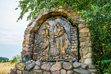 Swiebodzin, Poland - August 21, 2021. Religion symbols by the tallest statue of Jesus Christ