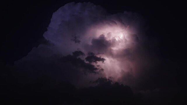 Super slow motion Lightning Bolt with visible coronal discharge emerging from Storm Cloud.