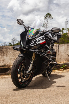 Aggressive front three-quarter view of a modified BMW S1000RR