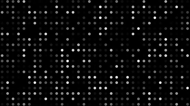 Black background with dynamic white dots forming a digital LED-style light pattern
