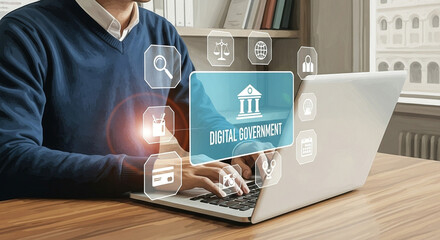 Person using laptop with digital government interface and icons overlaying the screen at a desk