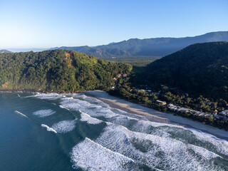 Small island between two beaches with green waters Camburi © Rodrigo