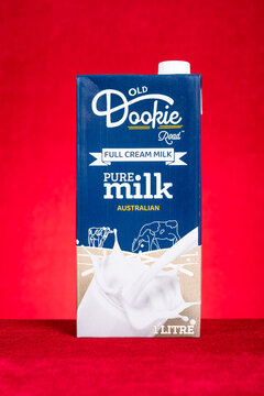 ZHONGSHAN China-June 17 2025: box of Old Dookie Road full cream pure milk on red at vertical composition.