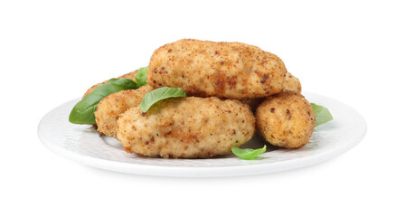 Tasty fried croquettes and basil isolated on white