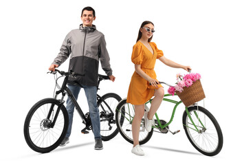 Handsome man and beautiful woman with bicycles on white background