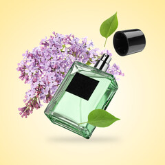 Bottle of floral perfume and blossoming lilac in air on beige gradient background